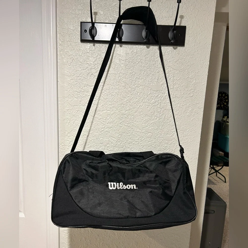 Wilson duffle bag/gym bag. Approximately 10 x 18 x 11.